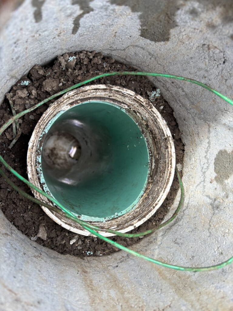Broken sewer cleanout repair for residential plumbing system