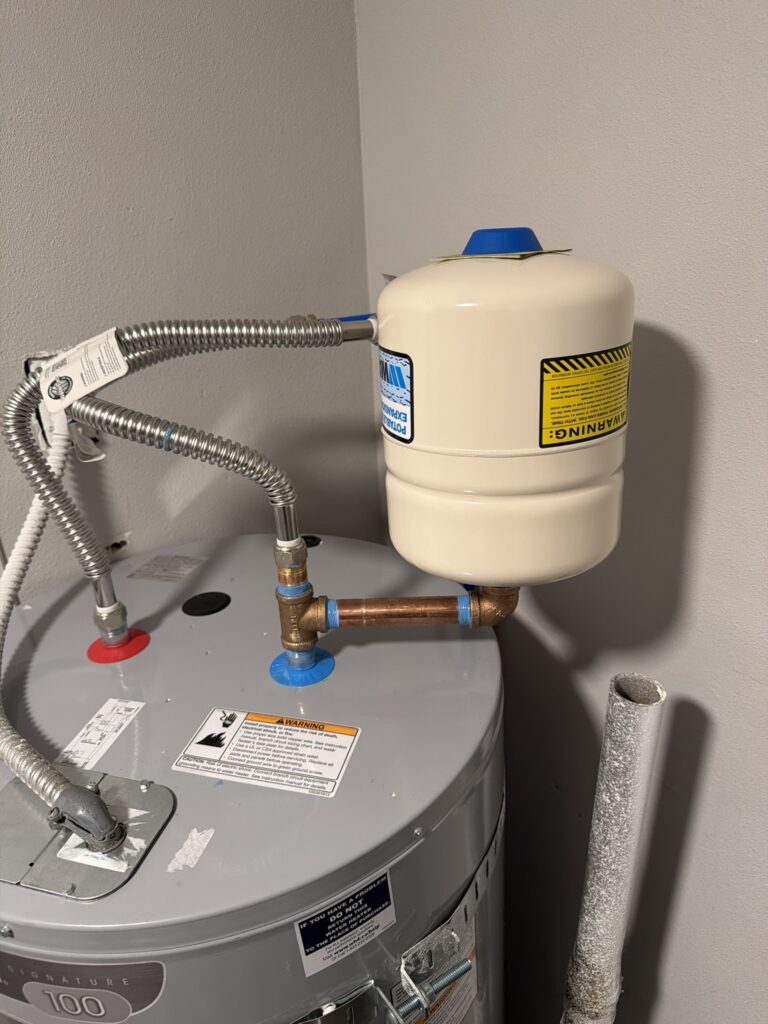 Residential plumbing water heater expansion tank installation