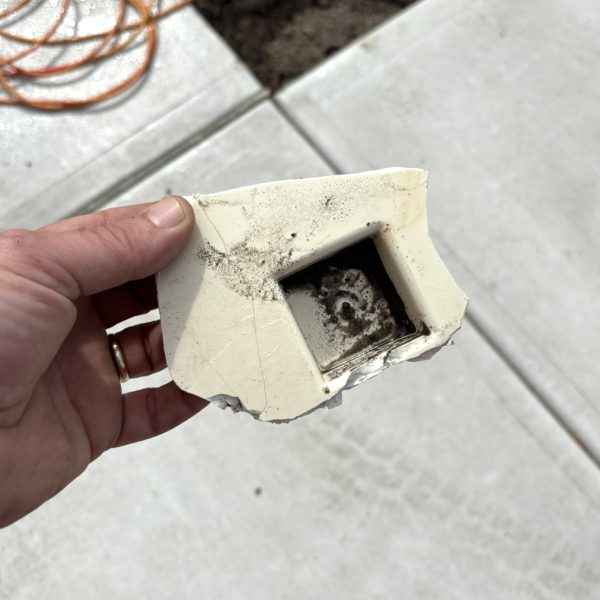 Broken PVC sewer cleanout fitting removed from residential main sewer line in Longview WA.