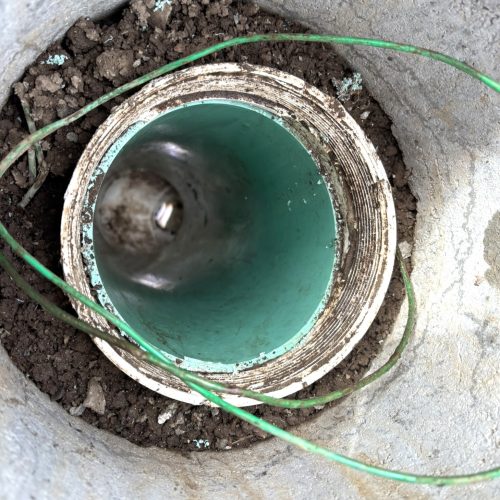 Residential sewer cleanout after broken fitting extraction and sewer line repair in Longview WA.