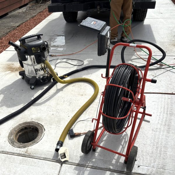 Professional sewer cleanout extraction equipment and sewer camera used for main sewer line repair in Longview WA.