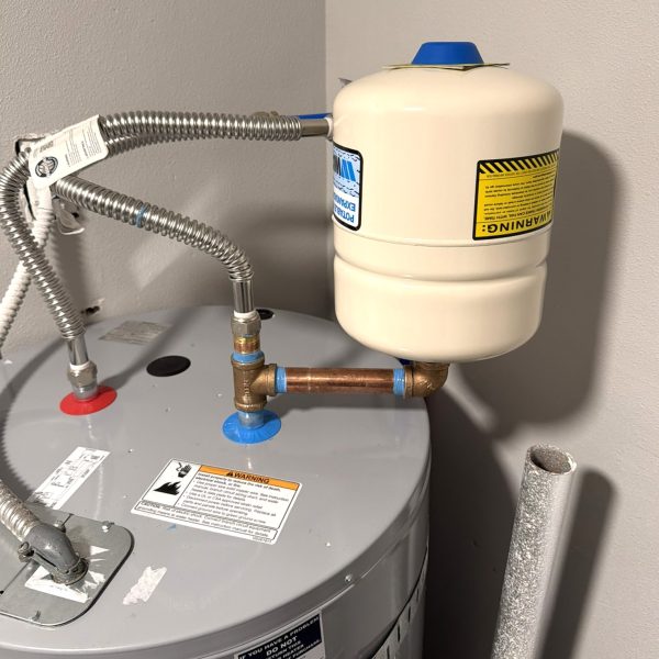 Pressure tank installation for residential water heater