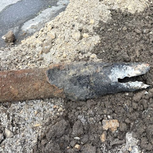 Damaged cast iron sewer pipe requiring sewer line replacement in Longview, WA